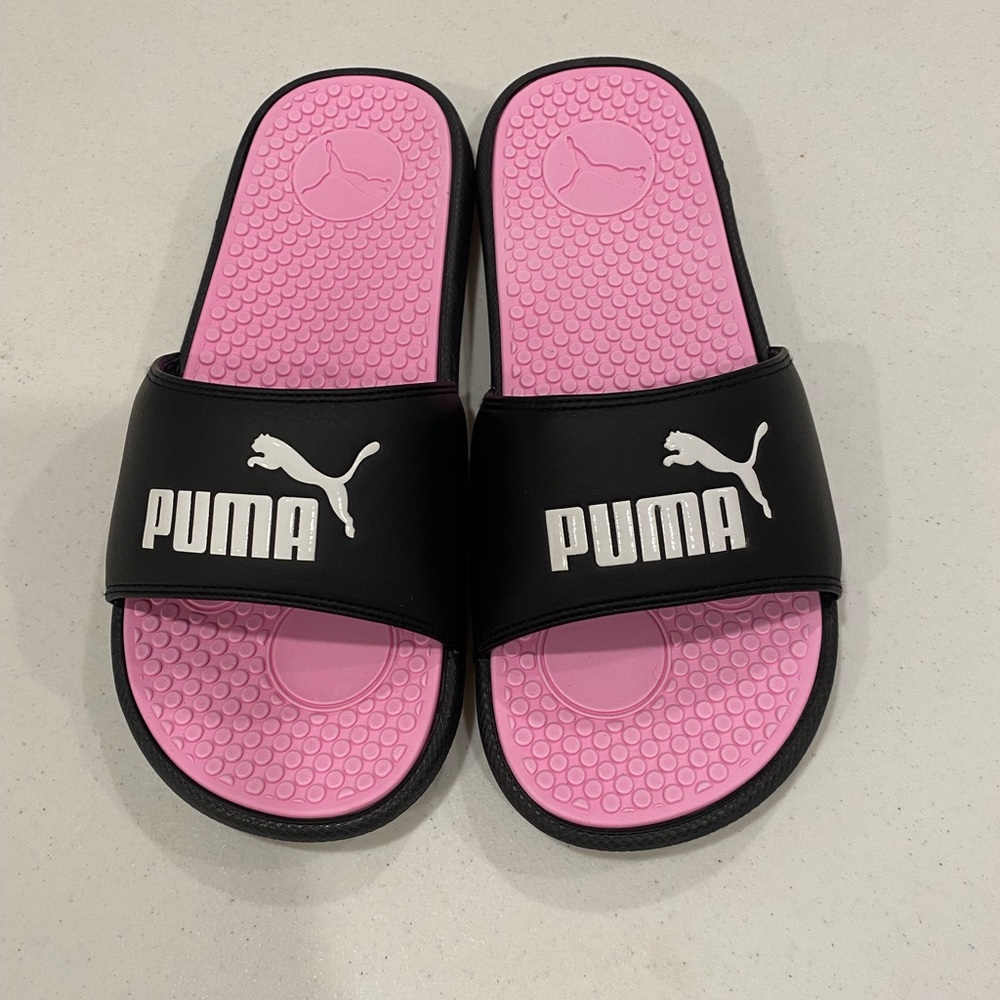 Puma pink and black slides